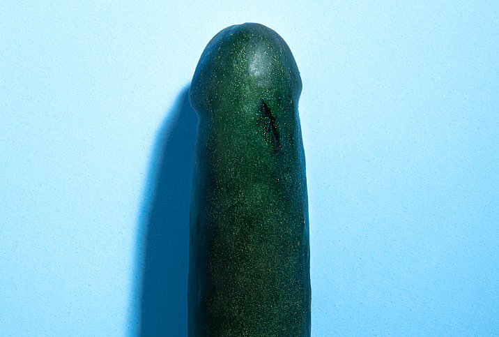 A green zucchini with a circumcision scar.