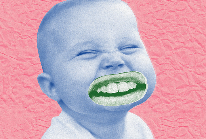 A squinting baby has an adult mouth with teeth photoshopped over its mouth.