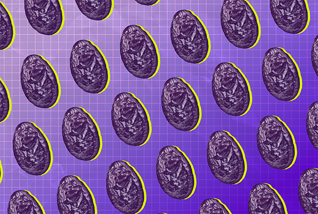 A pattern of prunes is against a gradient background that goes from white to purple.