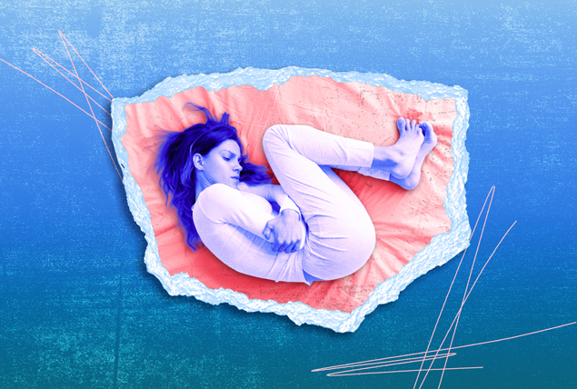 woman in fetal position on pink blanket with ribbed edges on blue background