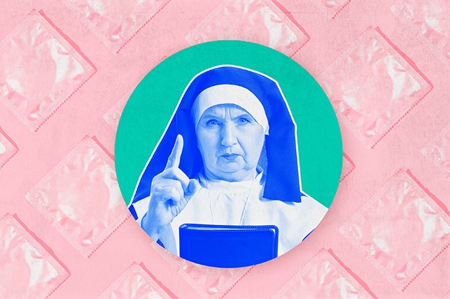 A nun holds a finger up as she looks forward in the middle of a green screen and against a pink background.