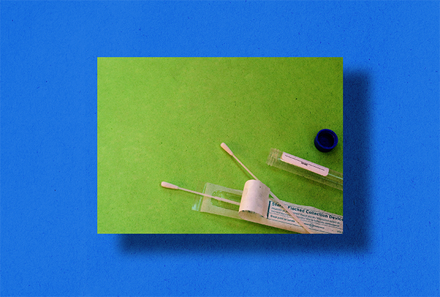 green square with test tube, cotton swab and other hormone test kit materials on blue background