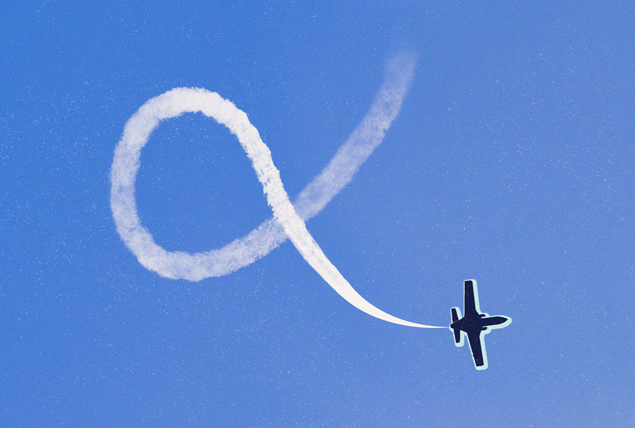 small plane making infinity symbol with chem trail on sky blue background