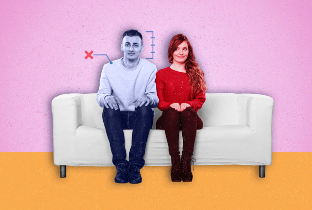 woman and grayscale man sit on white couch with bracket and red X by his face on pink and orange background
