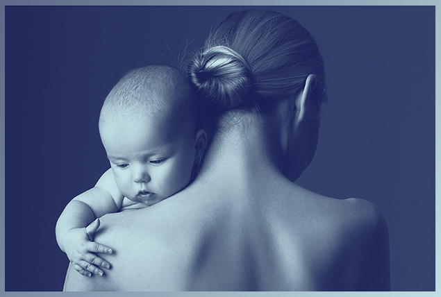 A woman is shown from behind holding a newborn baby with a blue overlay.
