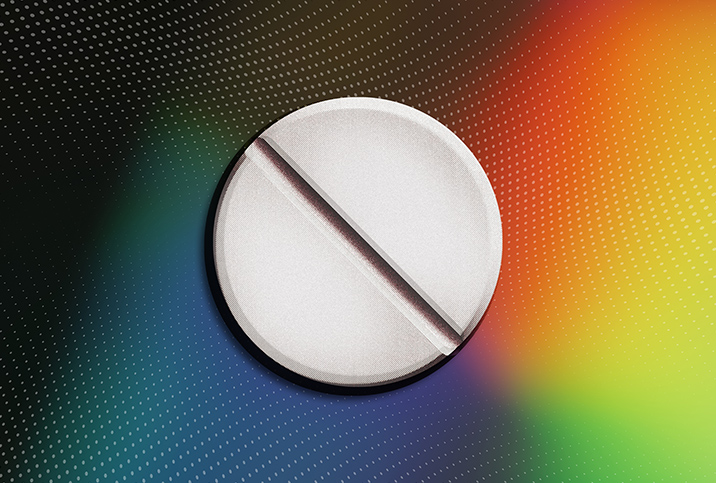 A while pill sits against a multicolored background with white dots.