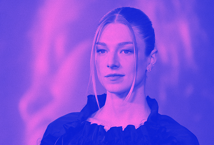 Trans actress Hunter Schafer from the TV show Euphoria poses for press photos with a purple overlay.