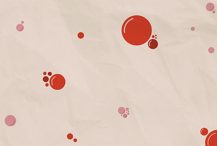 Blood droplets are scattered against an off-white surface.