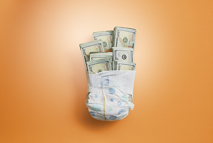 A diaper is wrapped around seven bundles of hundred-dollar bills.