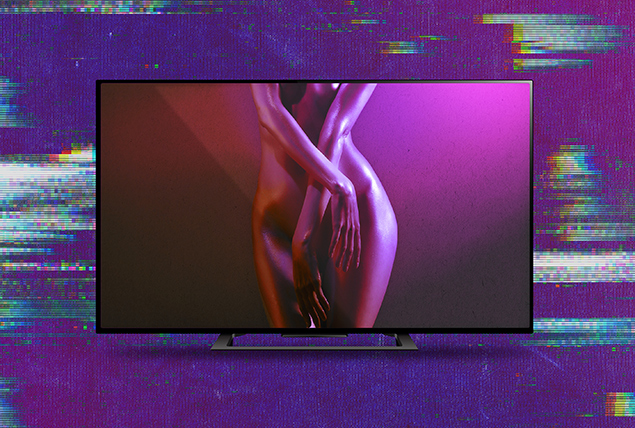 A TV shows a nude woman with her crossed over her body as a purple light shines behind her.