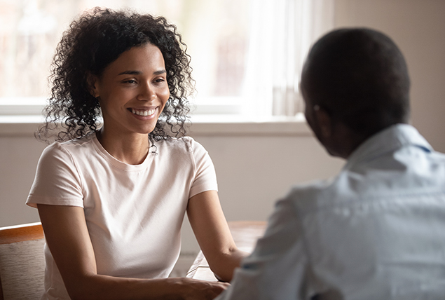 A woman talks to her partner about IVF.